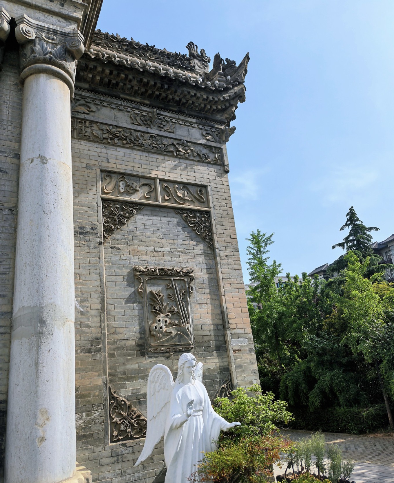 Angel statue inside the church courtyard