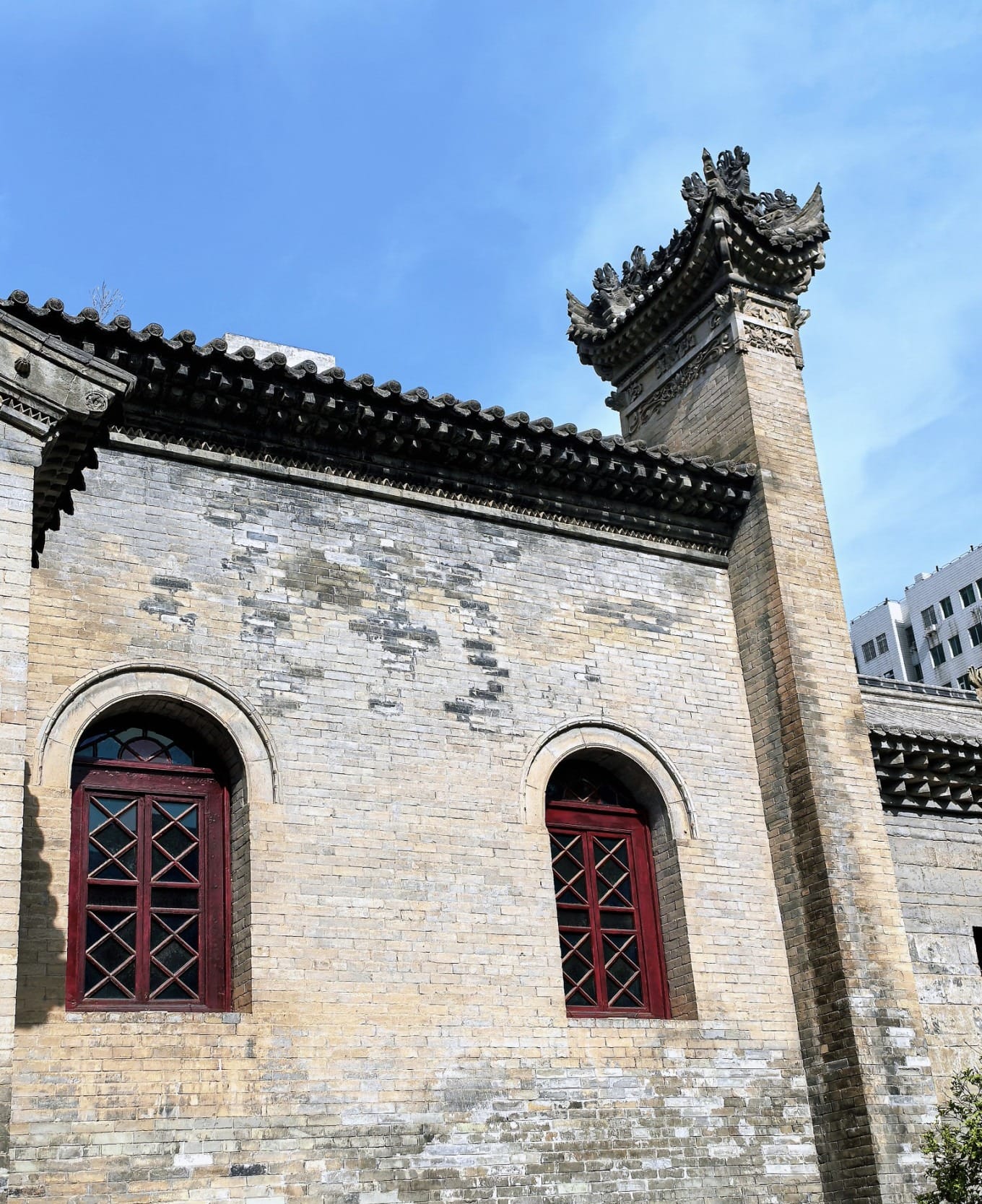 Close-up of architectural junction between Chinese and Western styles