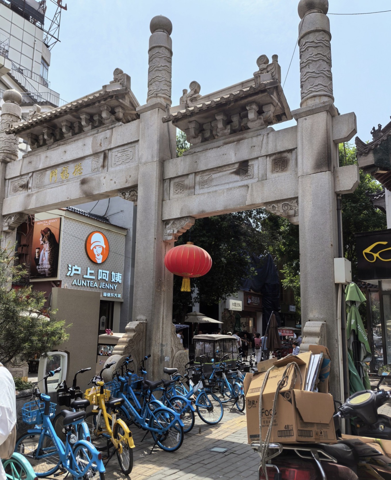 Entrance of Defu Lane showing a contrast between the street view and the cozy lane inside