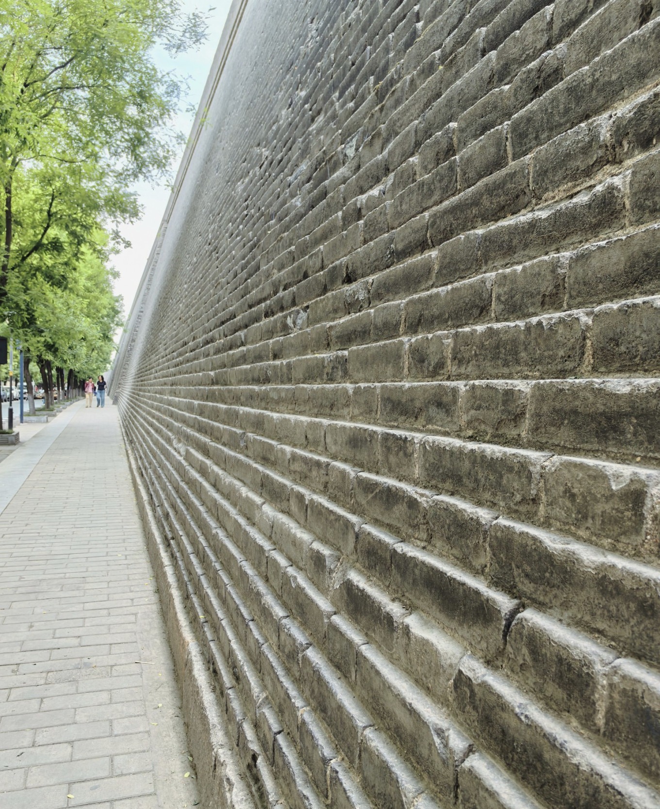 City wall seen from the museum courtyard with depth perspective