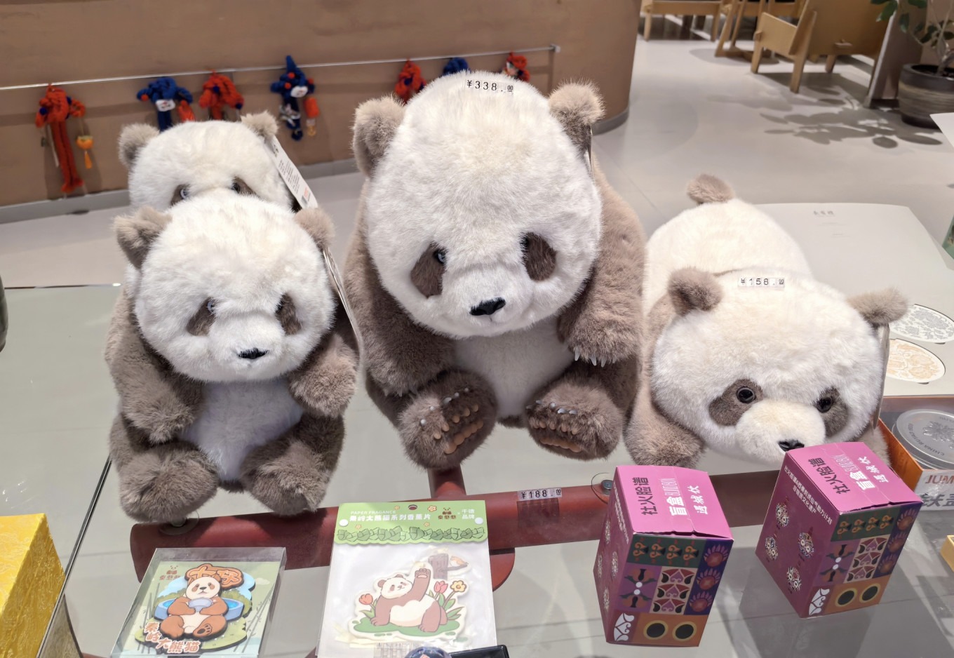 Cute panda figurine with a humorous caption about fur color