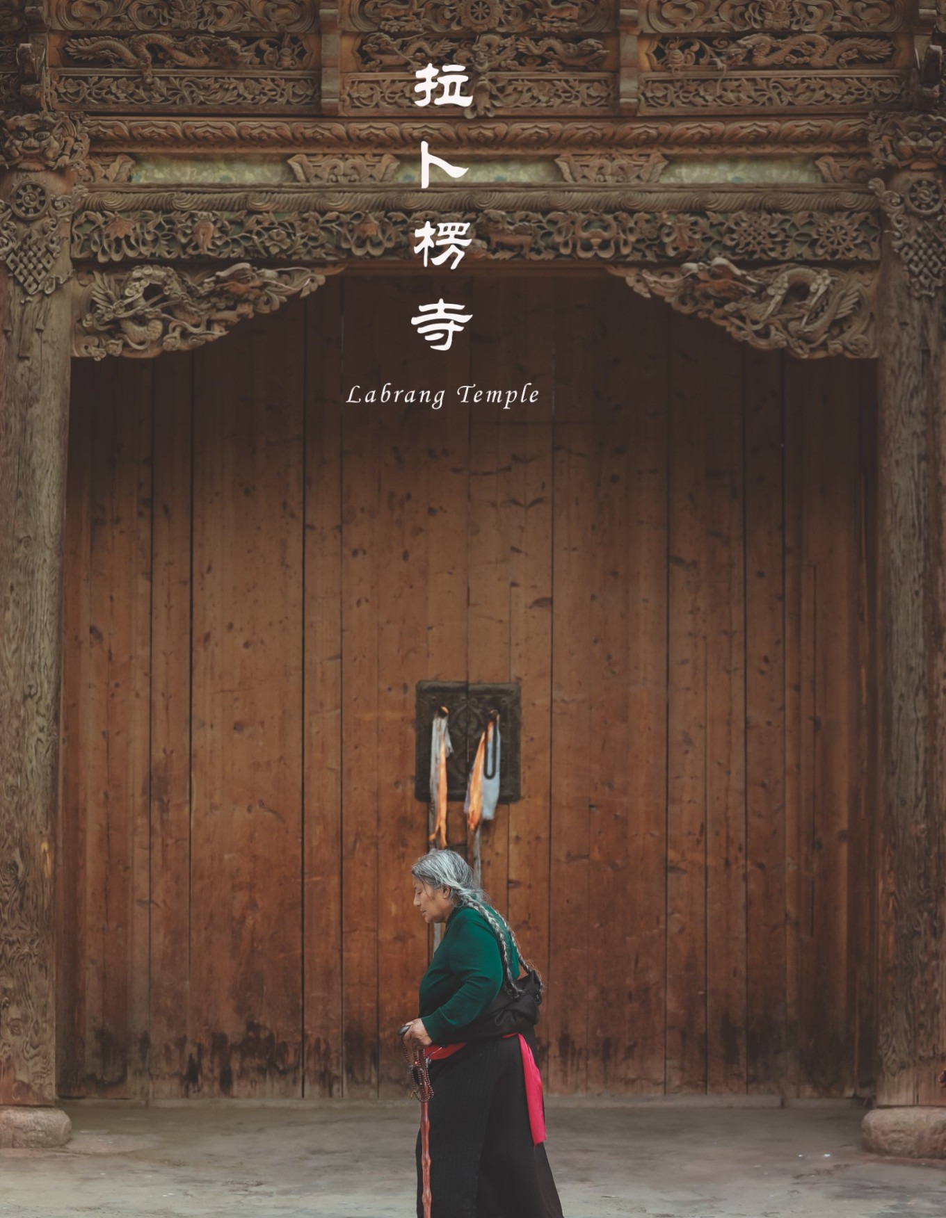 First light of morning illuminating the golden roof of Labrang Monastery