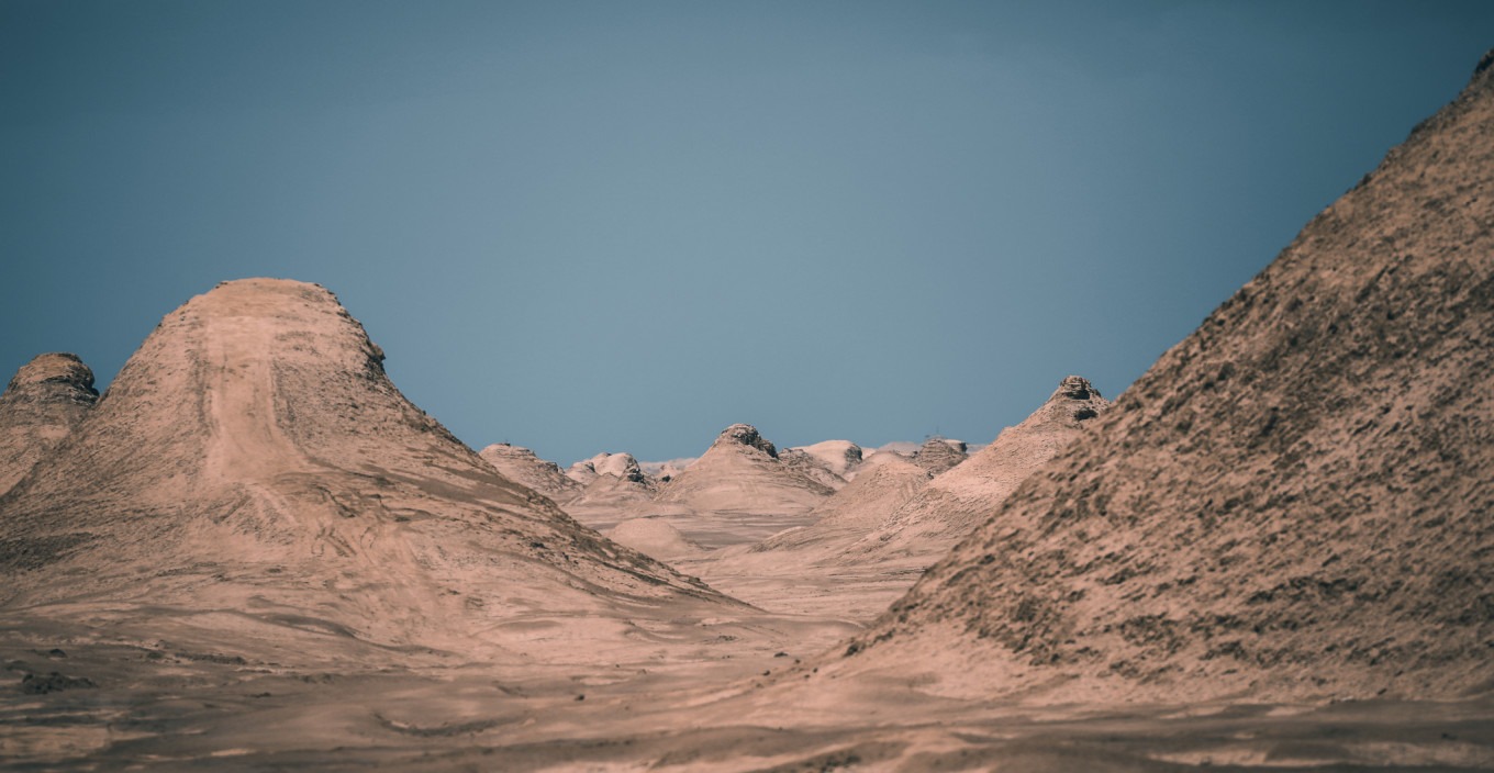 Sunset light on Yadan mounds creating golden hues