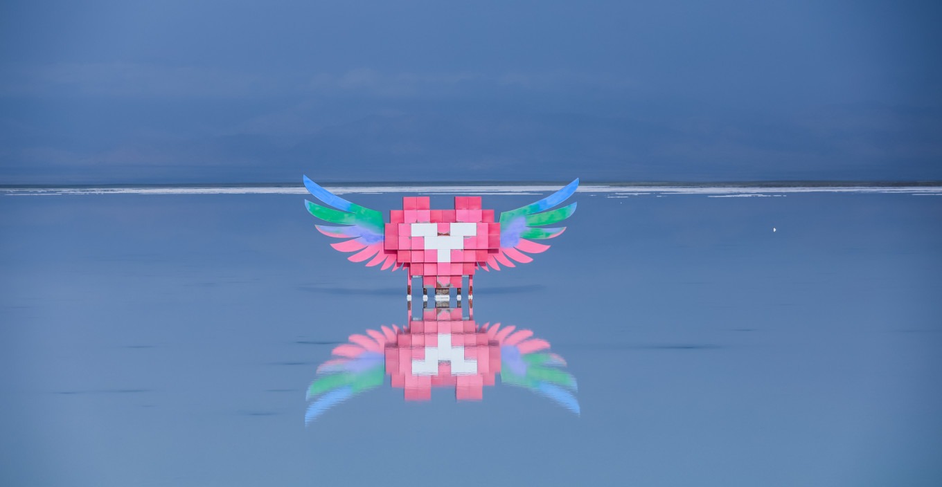 Reflection of a person on the salt lake