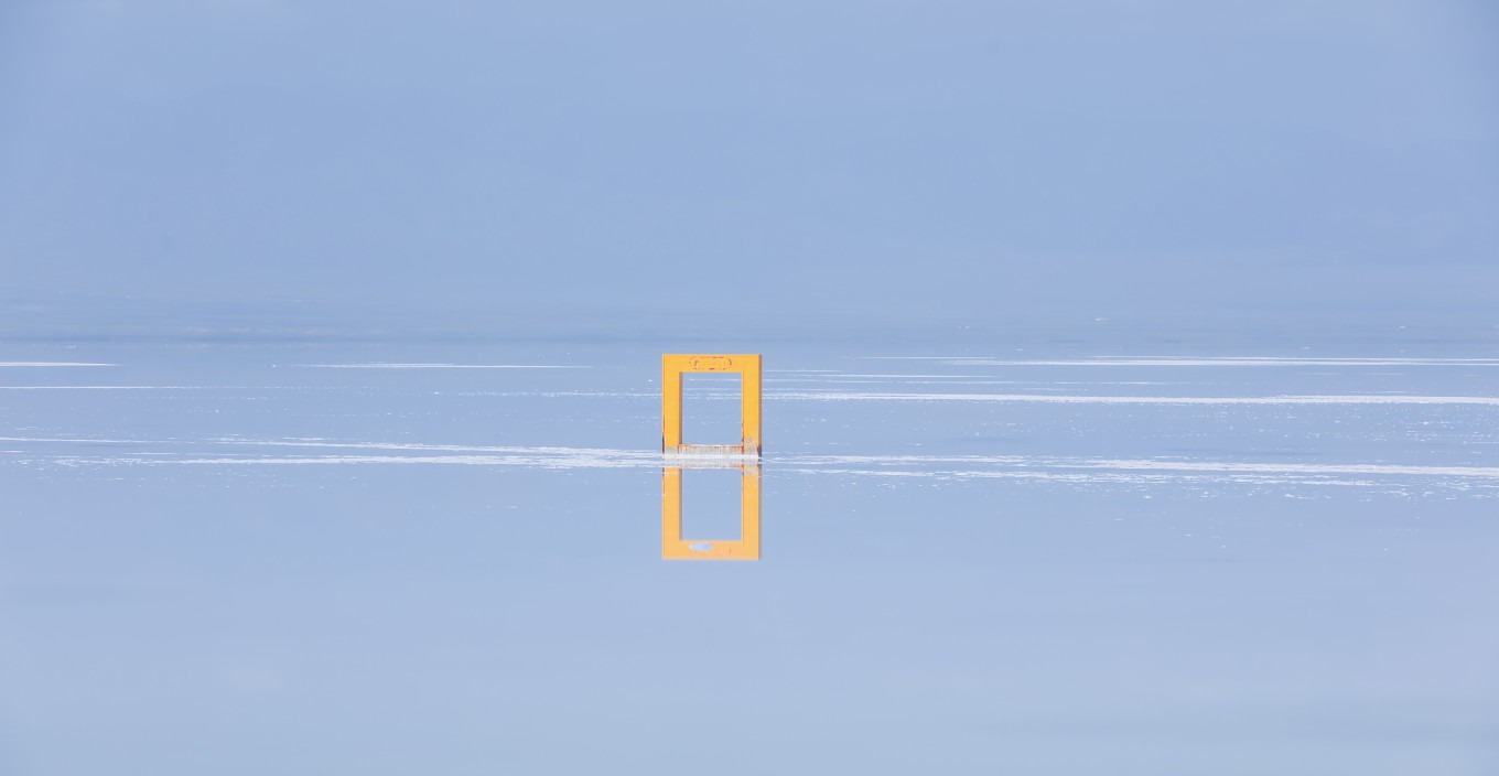 Tourists walking on the salt lake