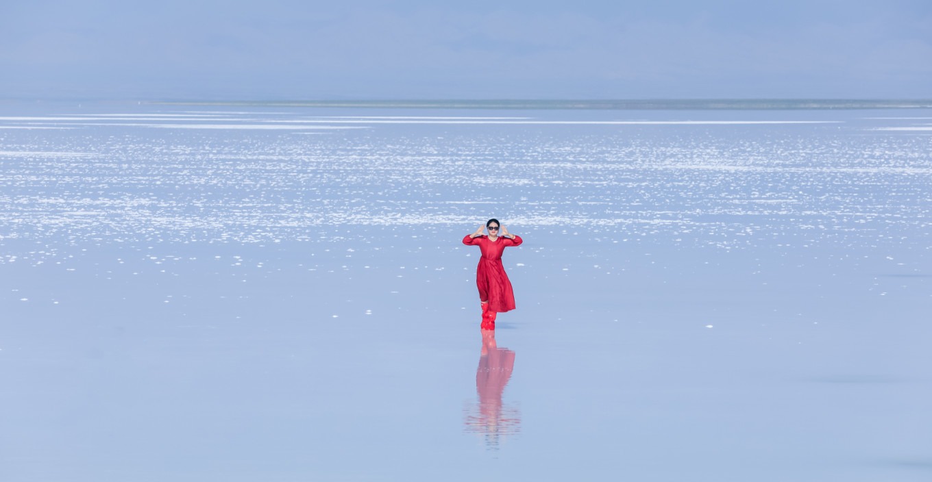 Silhouette of a person on the salt lake