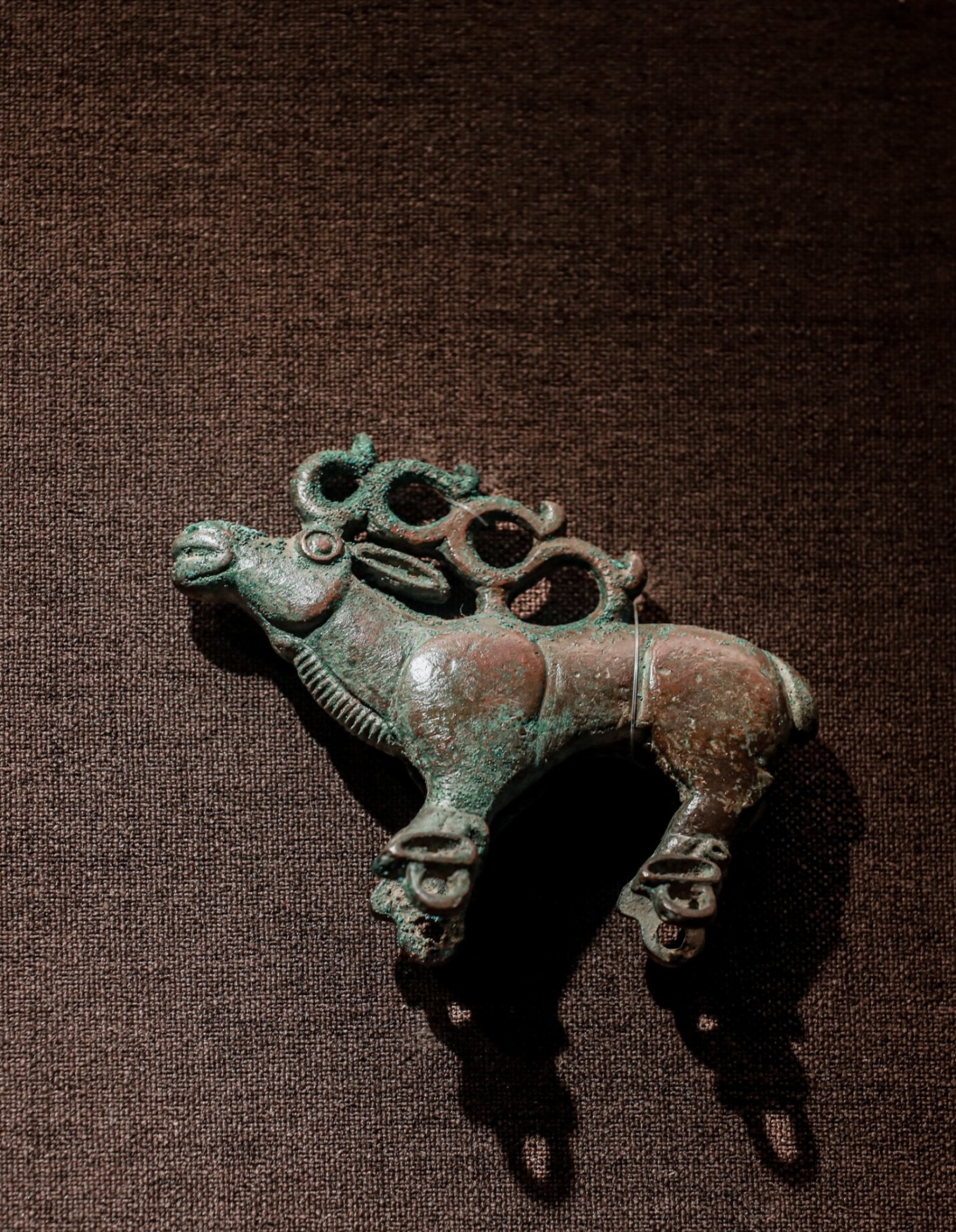 Eagle-headed bronze scepter top