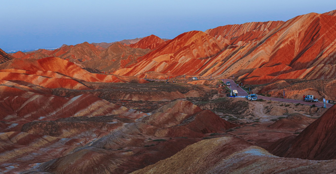 Sunset view from Rainbow Splendor Terrace with colorful hills