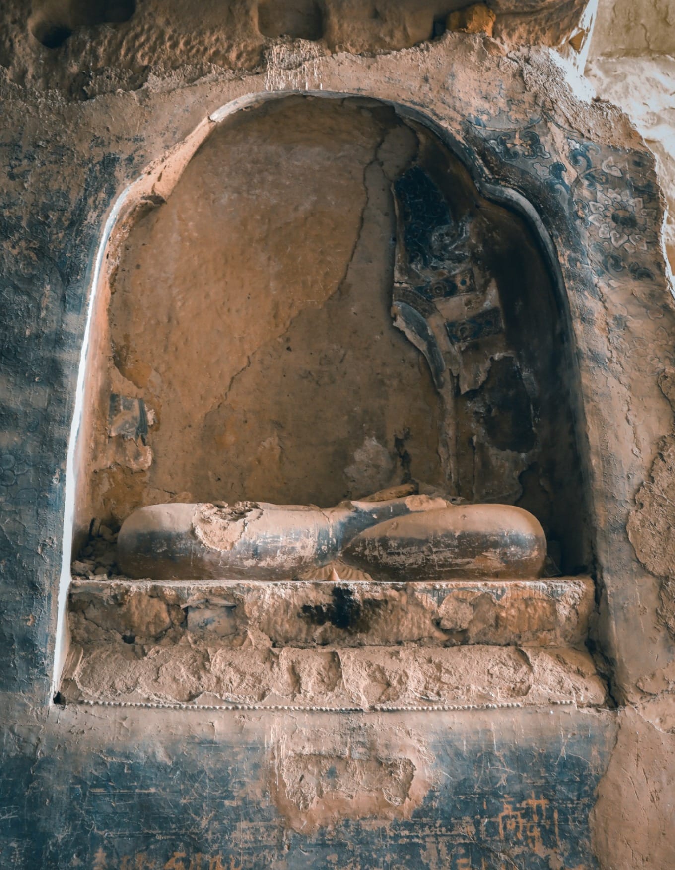 Detailed view of statue fragment showing fine workmanship