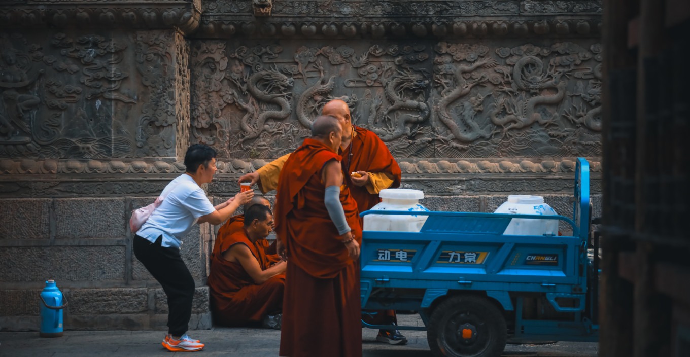 Cups of milk tea offered during alms-giving