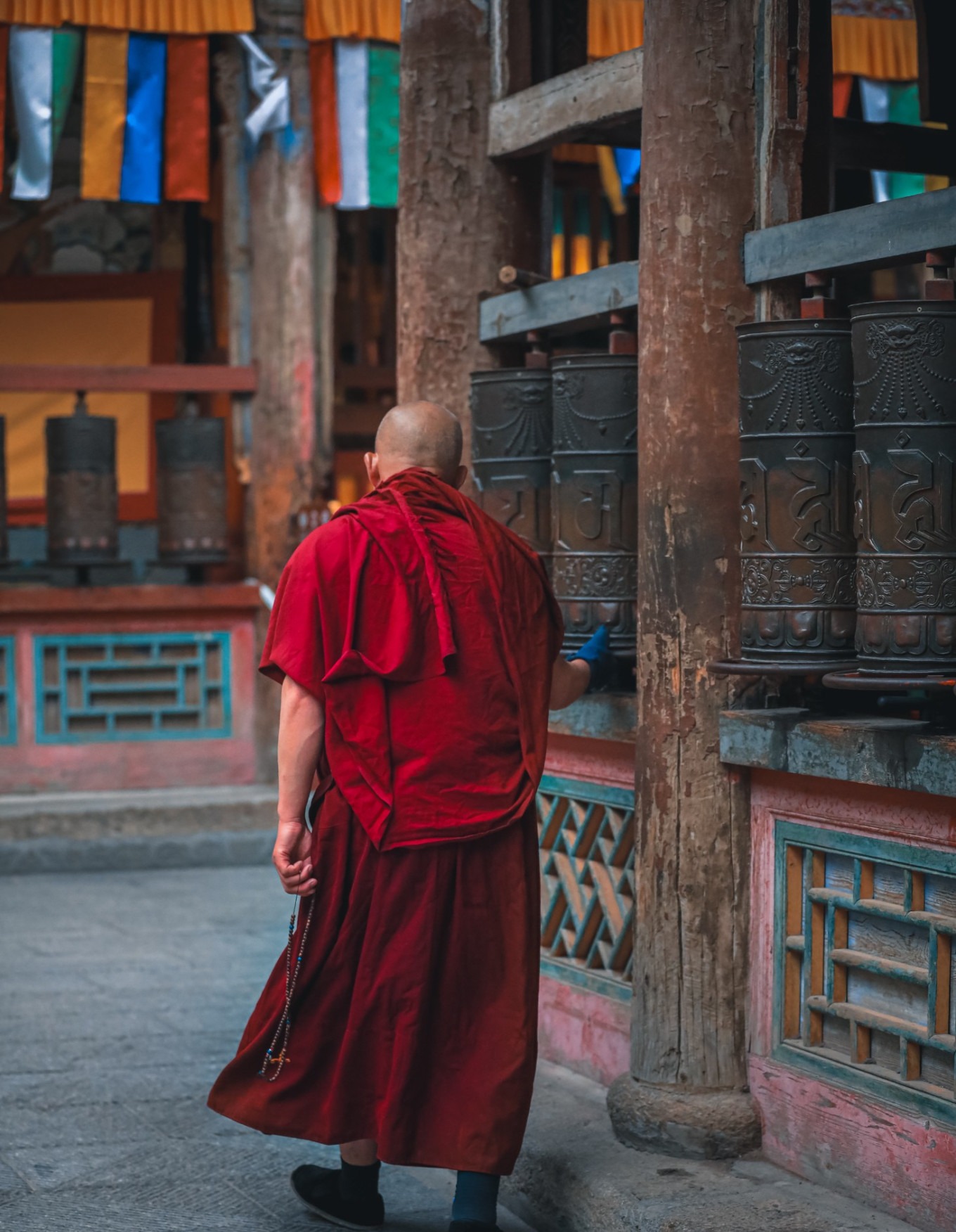 Close-up of prayer wheels being turned