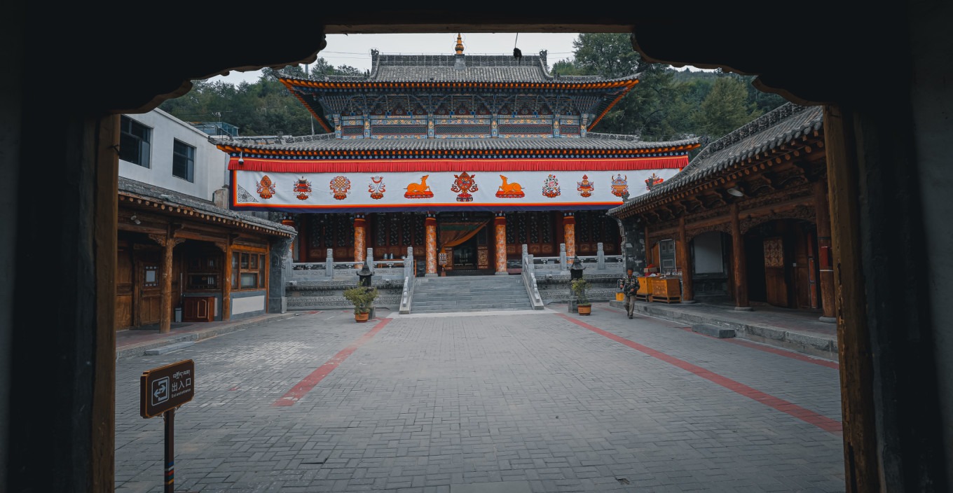 Empty courtyard with golden roof in background