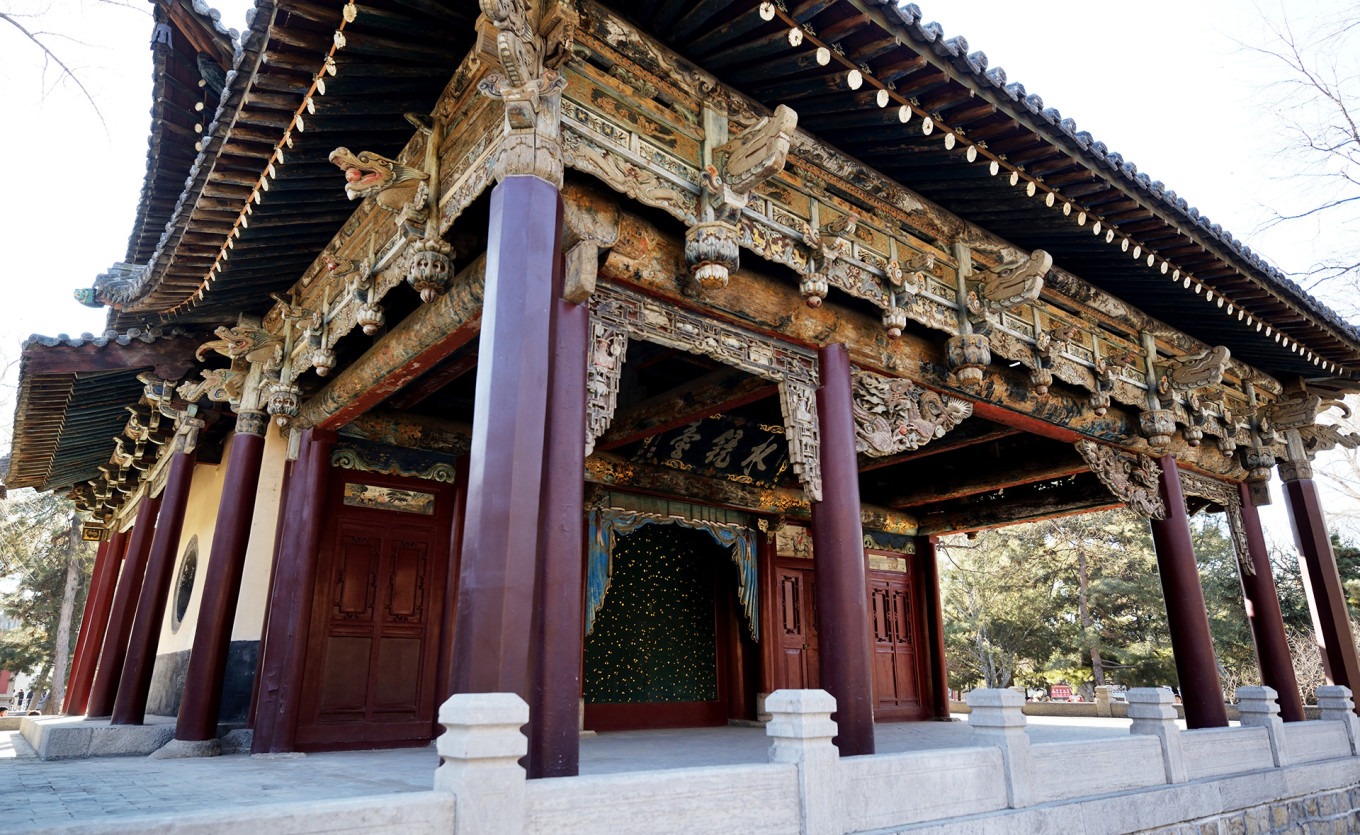 Painted beams and opera scenes on Water Mirror Terrace